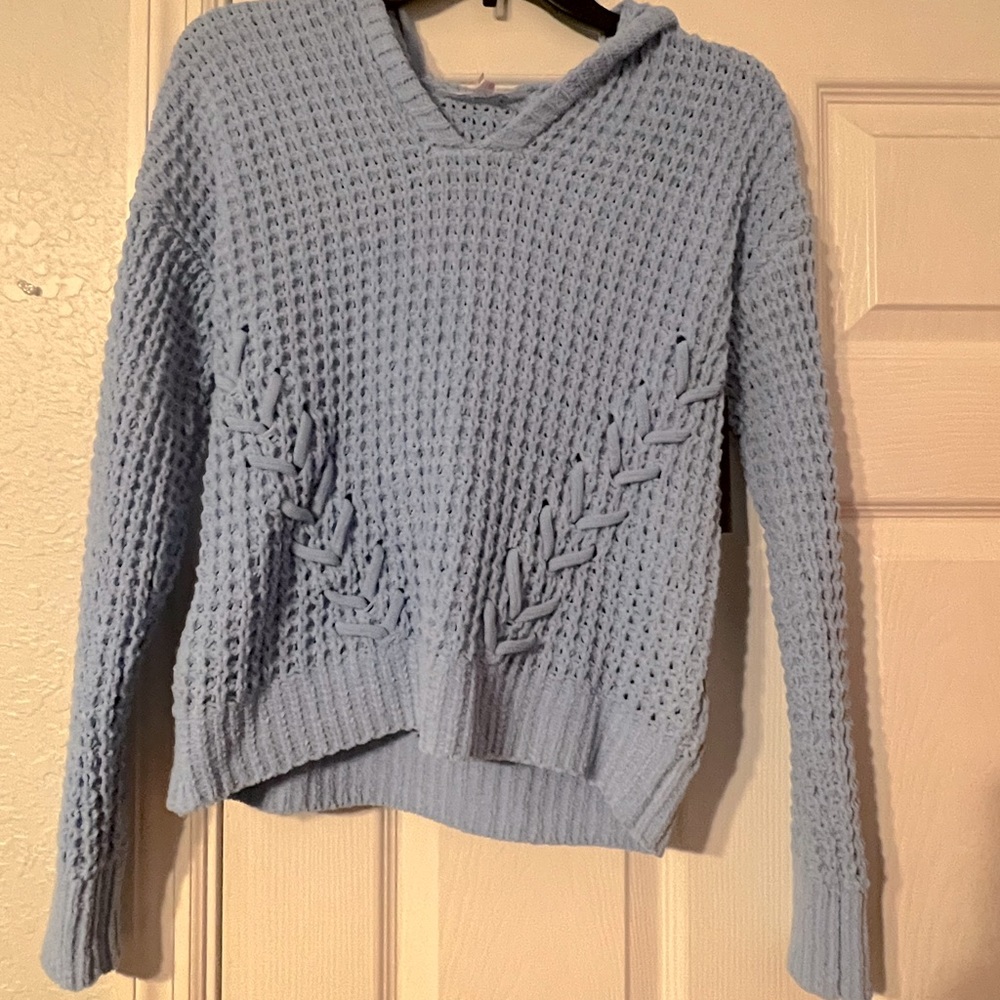 Baby blue sweater it is super cute and never worn!